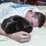 Cat and owner sleeping photograph