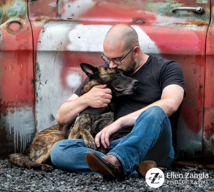 Photo of man hugging his dog by Ellen Zangla Photography in Loudoun County VA
