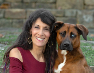 Photographer Ellen Zangla, owner of Ellen Zangla Photography, with her dog Lola