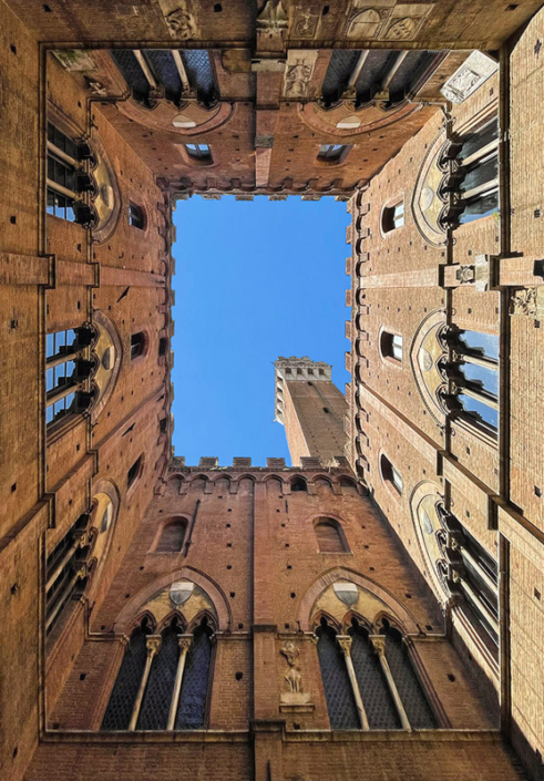 Roofless church in Siena, Italy, photographed while lying down and looking up.
